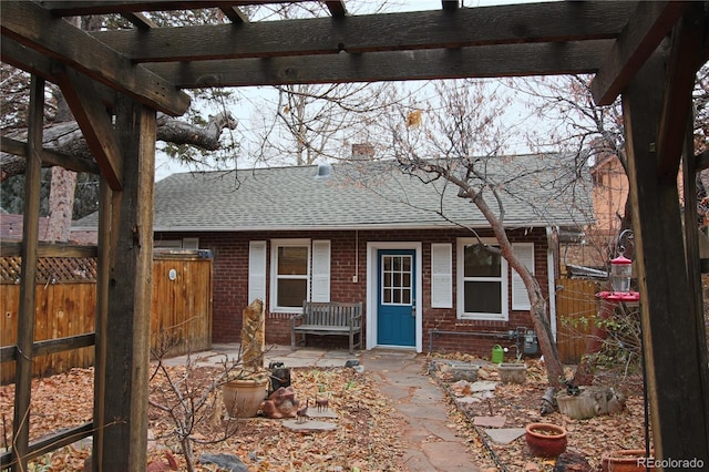 view of front of property featuring a pergola