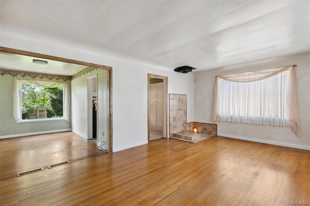 305 W Brookside St, Colorado Springs, CO 80905 - empty room featuring wood finished floors and baseboards