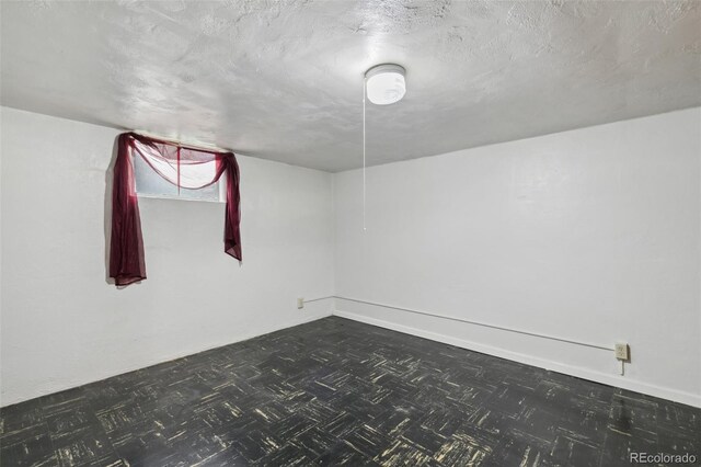 305 W Brookside St, Colorado Springs, CO 80905 - unfurnished room featuring a textured ceiling and baseboards