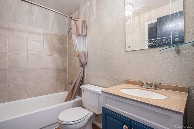 bathroom with shower / tub combo, a textured wall, toilet, and vanity