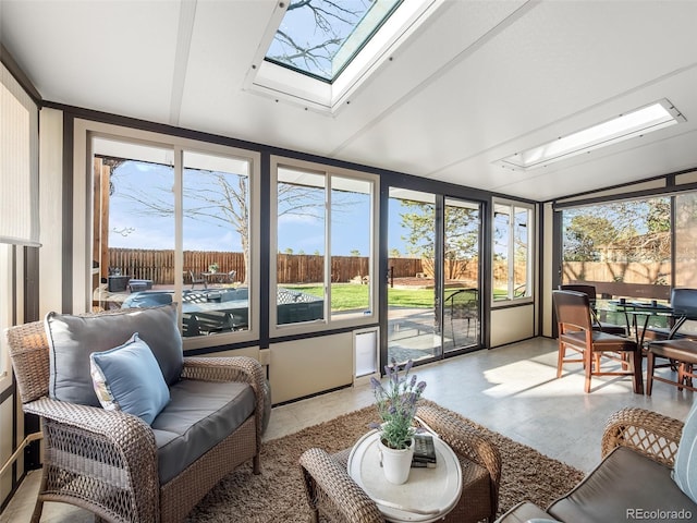 sunroom / solarium with a skylight and plenty of natural light
