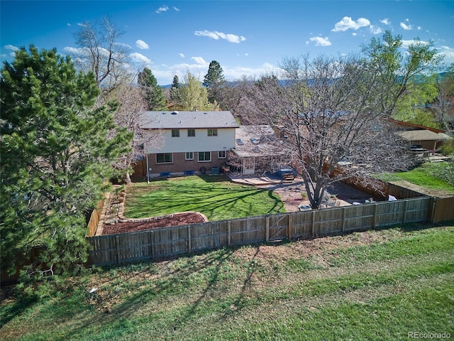view of yard featuring a fenced backyard and a patio area