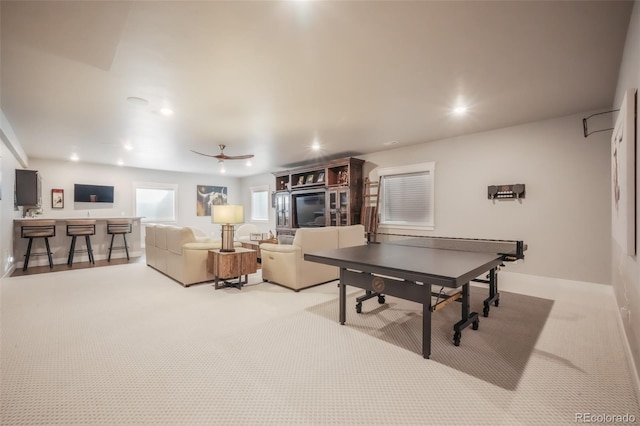 game room featuring a ceiling fan, light colored carpet, and recessed lighting