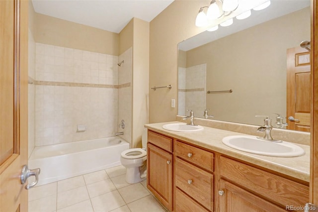 16231 Rayburn St, Hudson, CO 80642 - full bath with tile patterned floors, toilet, double vanity, and tub / shower combination