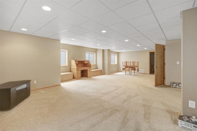 16231 Rayburn St, Hudson, CO 80642 - below grade area featuring carpet floors, a drop ceiling, baseboards, and recessed lighting