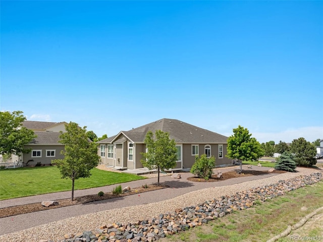 16231 Rayburn St, Hudson, CO 80642 - ranch-style home with a front lawn