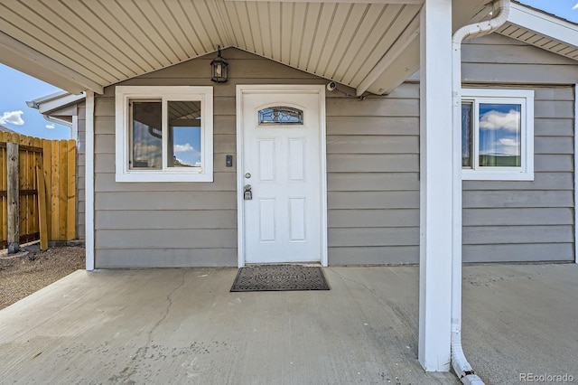 1533 E Harlan, Lakewood, CO 80214 - view of exterior entry featuring fence