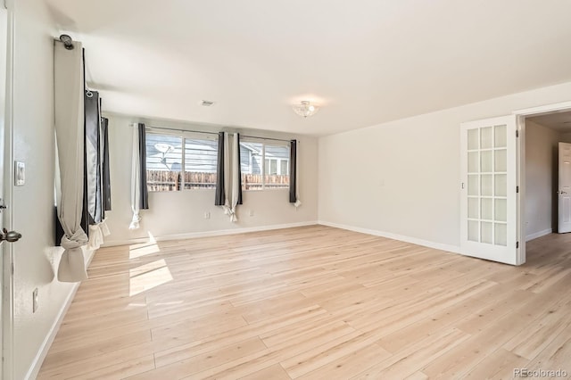 1533 E Harlan, Lakewood, CO 80214 - empty room featuring light wood finished floors and baseboards