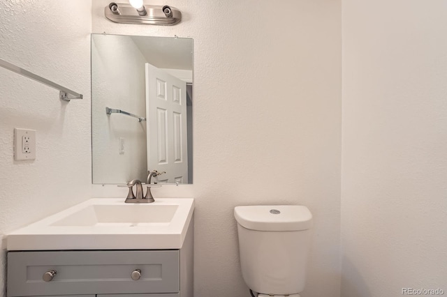 1533 E Harlan, Lakewood, CO 80214 - bathroom featuring vanity and toilet