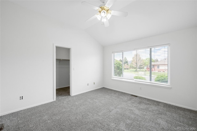 6193 Terry Ct, Arvada, CO 80403 - unfurnished bedroom with carpet flooring, vaulted ceiling, baseboards, a walk in closet, and ceiling fan