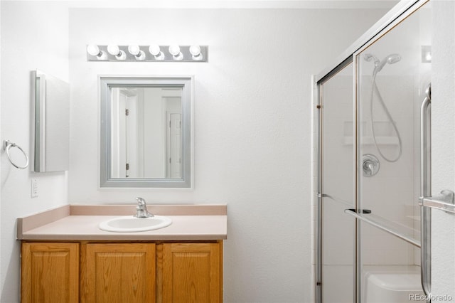 6193 Terry Ct, Arvada, CO 80403 - bathroom featuring a stall shower and vanity