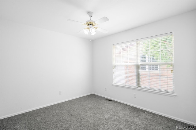 6193 Terry Ct, Arvada, CO 80403 - carpeted empty room with healthy amount of natural light, baseboards, and ceiling fan