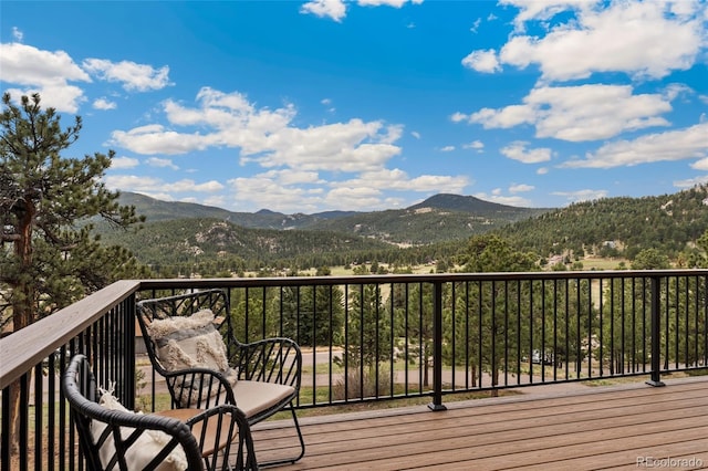 6640 Kilimanjaro Dr, Evergreen, CO 80439 - wooden deck with a mountain view
