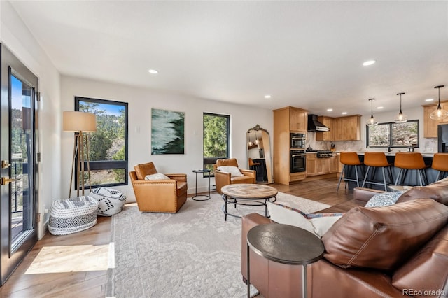 6640 Kilimanjaro Dr, Evergreen, CO 80439 - living area featuring recessed lighting and light wood-style floors