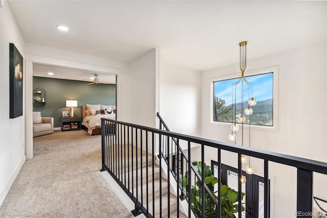 6640 Kilimanjaro Dr, Evergreen, CO 80439 - hallway featuring carpet floors, recessed lighting, baseboards, and an upstairs landing