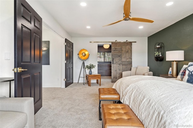 6640 Kilimanjaro Dr, Evergreen, CO 80439 - carpeted bedroom with recessed lighting, baseboards, a barn door, and ceiling fan