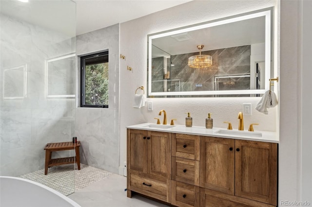 6640 Kilimanjaro Dr, Evergreen, CO 80439 - full bathroom featuring double vanity, a sink, a walk in shower, and tile walls