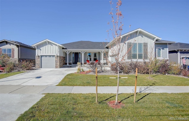 ranch-style house with a front yard and a garage