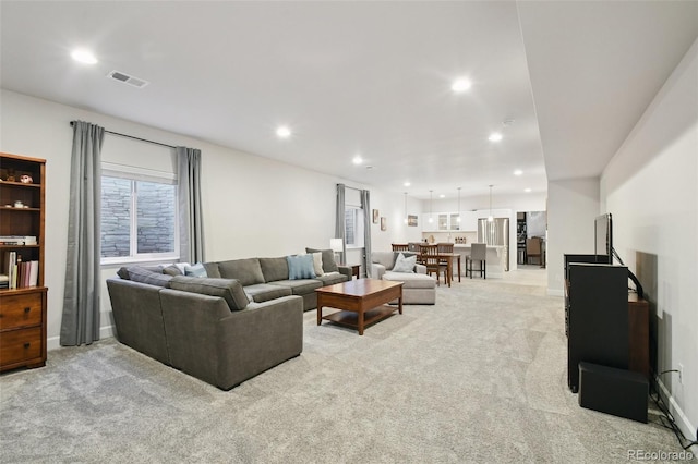 171 S Waterloo St, Aurora, CO 80018 - living room featuring light colored carpet and recessed lighting