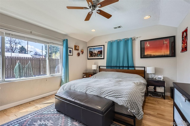 2901 N Glencoe St, Denver, CO 80207 - bedroom featuring lofted ceiling, baseboards, wood finished floors, recessed lighting, and a ceiling fan