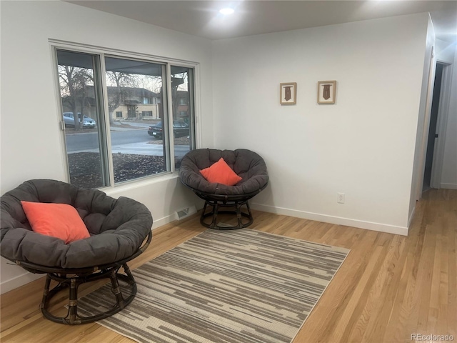 living area featuring hardwood / wood-style flooring