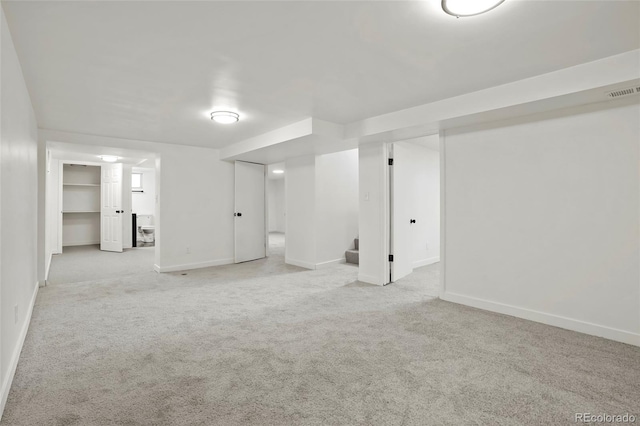 basement with light carpet