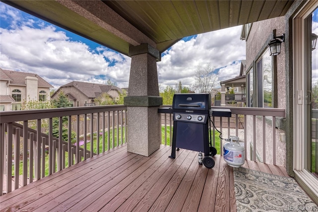 9952 Pinedale Dr, Colorado Springs, CO 80920 - wooden terrace featuring area for grilling and a residential view
