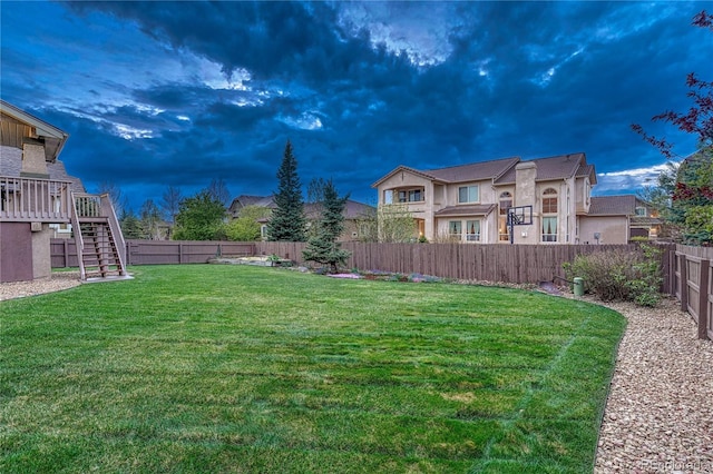 9952 Pinedale Dr, Colorado Springs, CO 80920 - view of yard with stairway and a wooden deck
