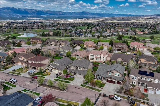 9952 Pinedale Dr, Colorado Springs, CO 80920 - aerial perspective of suburban area with a water and mountain view