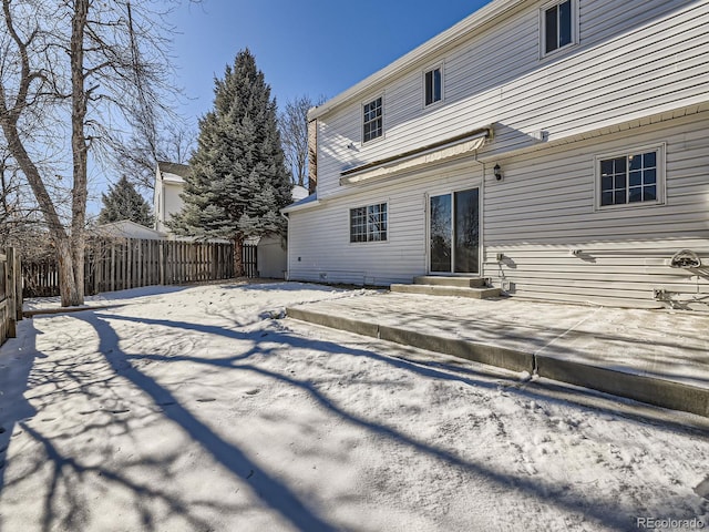 view of snow covered property