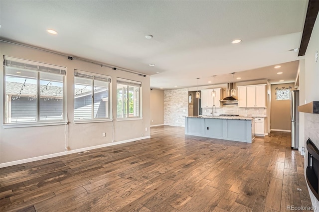15437 W 95th Ave, Arvada, CO 80007 - unfurnished living room featuring dark wood finished floors and recessed lighting