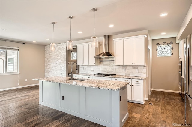 15437 W 95th Ave, Arvada, CO 80007 - kitchen featuring wall chimney exhaust hood, plenty of natural light, gas cooktop, backsplash, and recessed lighting