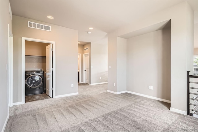 15437 W 95th Ave, Arvada, CO 80007 - unfurnished living room with washer / clothes dryer, carpet flooring, and recessed lighting