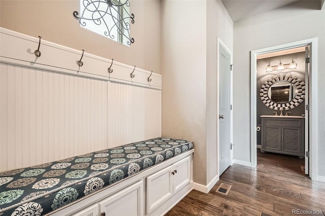 15437 W 95th Ave, Arvada, CO 80007 - mudroom with dark wood-style flooring and baseboards