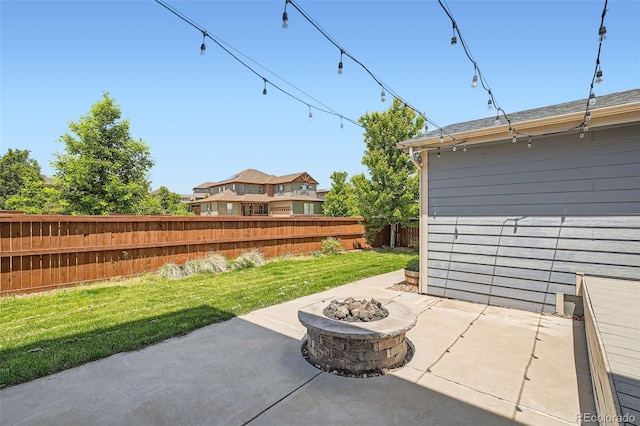 15437 W 95th Ave, Arvada, CO 80007 - fenced backyard with a fire pit and a patio area