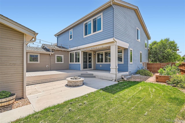 15437 W 95th Ave, Arvada, CO 80007 - rear view of property with a fire pit and a patio area