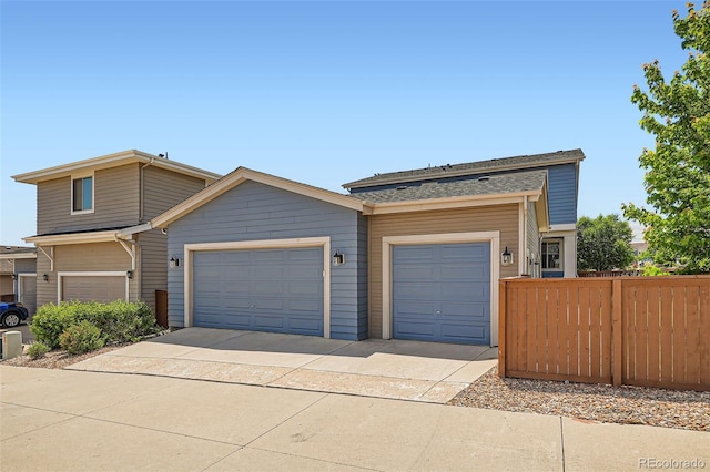 15437 W 95th Ave, Arvada, CO 80007 - view of front of home with driveway and a garage