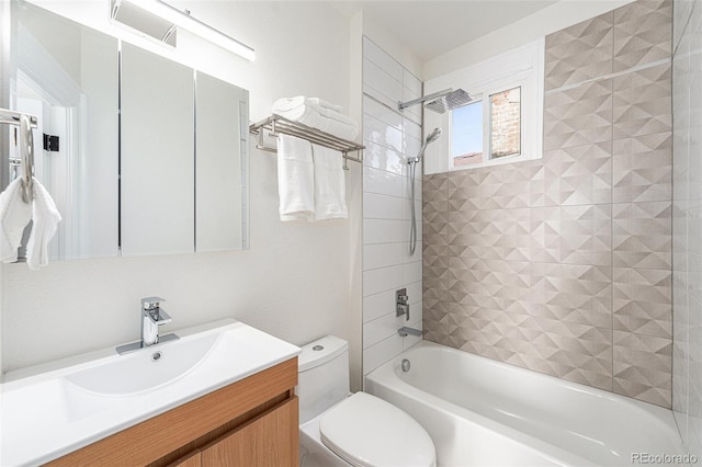 bathroom featuring shower / bathtub combination, toilet, and vanity