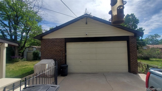 detached garage with a storage shed