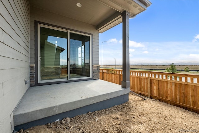 view of patio / terrace with fence