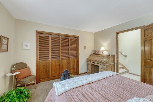 30 Eagle Dr, Littleton, CO 80123 - bedroom featuring light carpet and a closet
