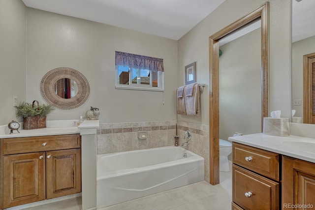 30 Eagle Dr, Littleton, CO 80123 - full bathroom with tile patterned flooring, toilet, two vanities, and a bath