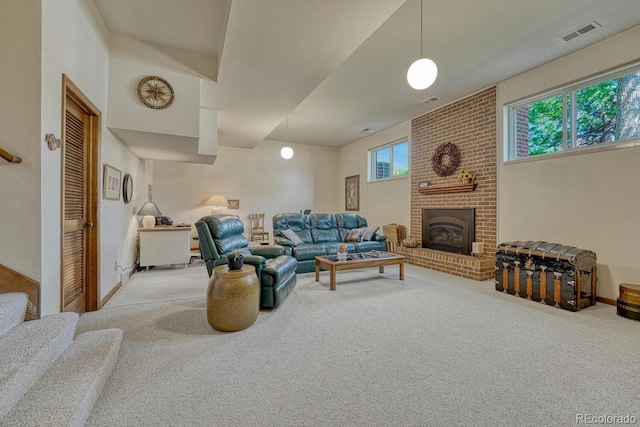 30 Eagle Dr, Littleton, CO 80123 - living area featuring carpet, a brick fireplace, and baseboards