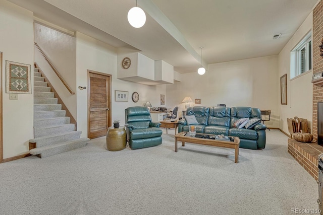 30 Eagle Dr, Littleton, CO 80123 - carpeted living area with stairway and a brick fireplace
