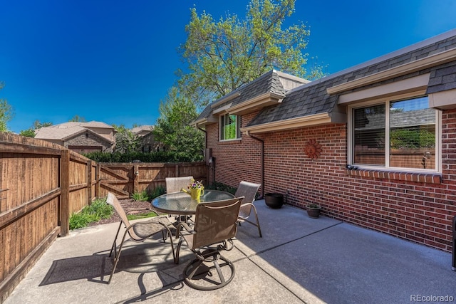 30 Eagle Dr, Littleton, CO 80123 - view of patio with a fenced backyard and outdoor dining area