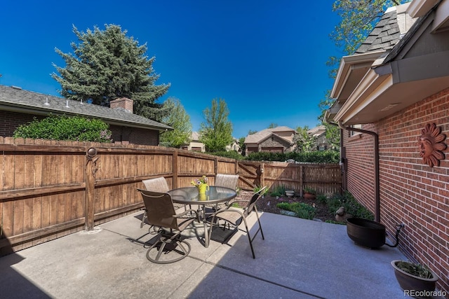 30 Eagle Dr, Littleton, CO 80123 - view of patio / terrace with outdoor dining space and a fenced backyard