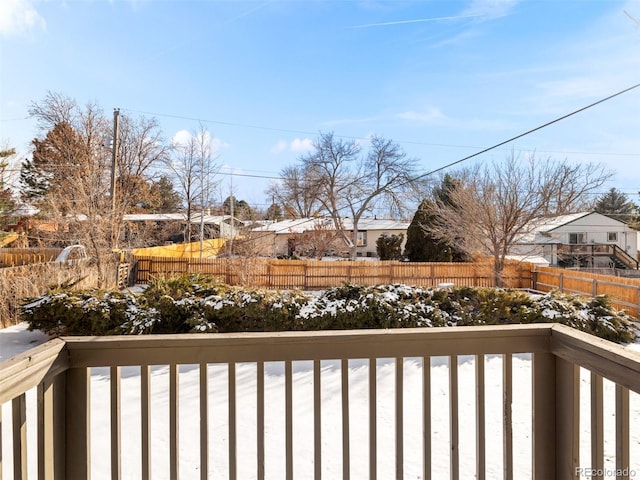 view of snow covered deck