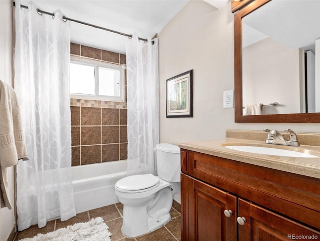 full bathroom featuring tile patterned floors, toilet, vanity, and shower / bath combination with curtain