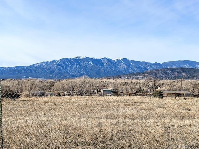 property view of mountains featuring a rural view