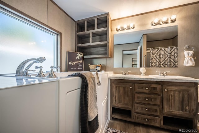 bathroom featuring vanity and hardwood / wood-style flooring